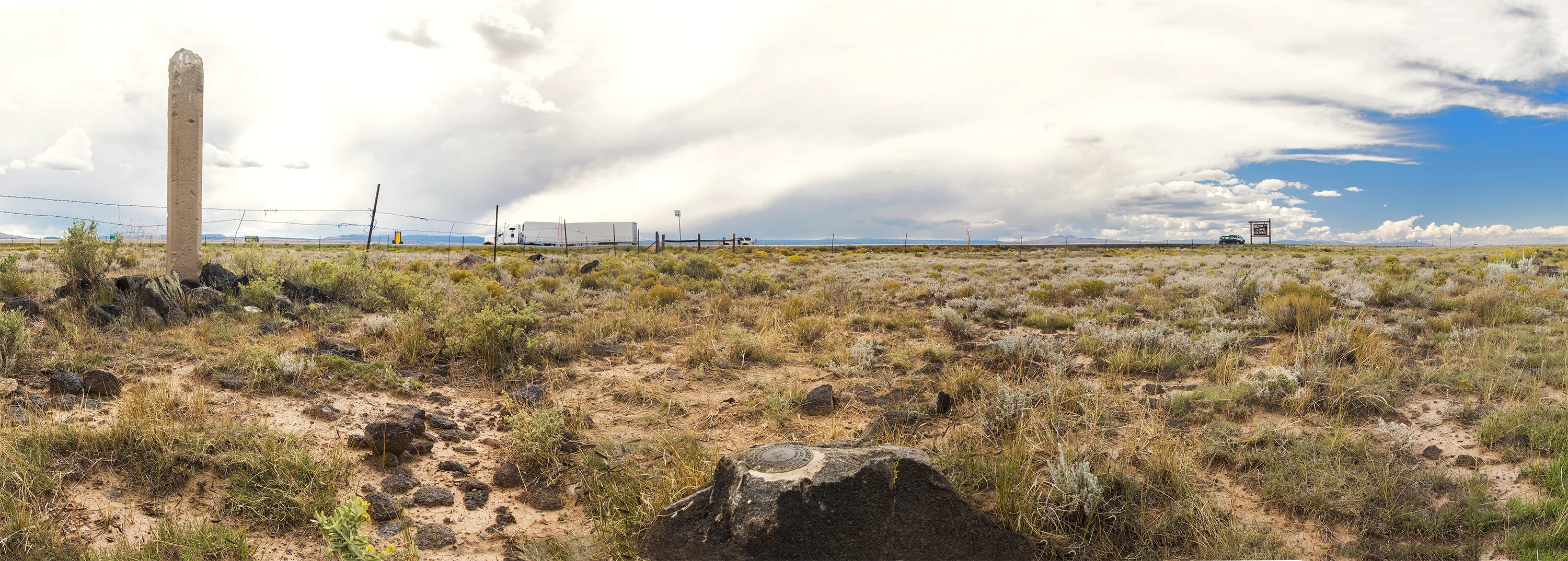 CO-NM Mile 163+22 chains looking east
