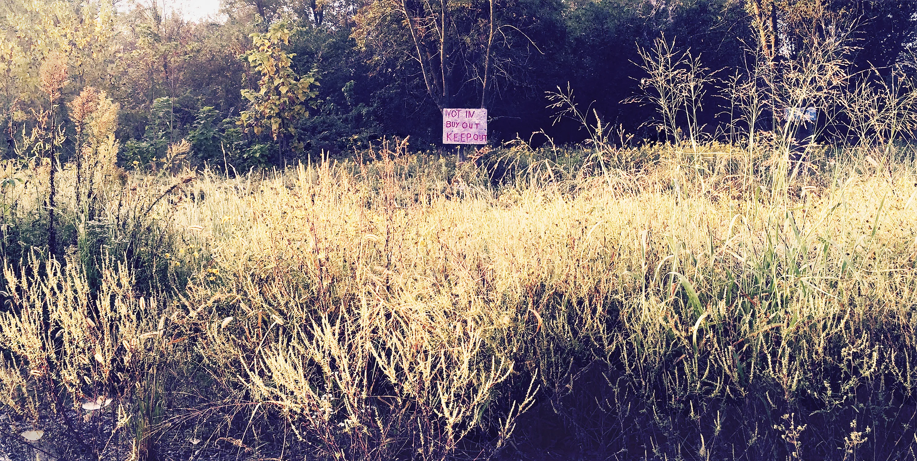 One property owner defiantly refused to participate in the EPA buyout. His defiance apparently came to an end: the holdout sign was no longer visible in 2023.